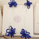 Pendientes Isakarpintero Flores Azul y Blanco