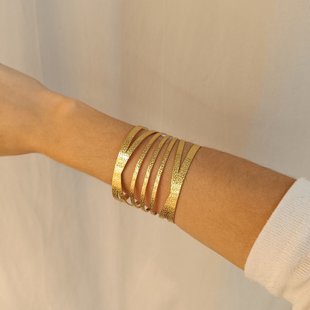 Brazalete Supreme Séxtuple Relieve Dorado
