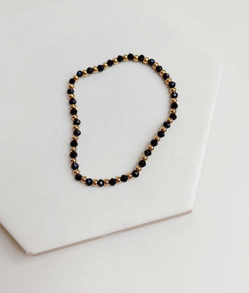 Pulsera Elástica Cuentas Negras Doradas