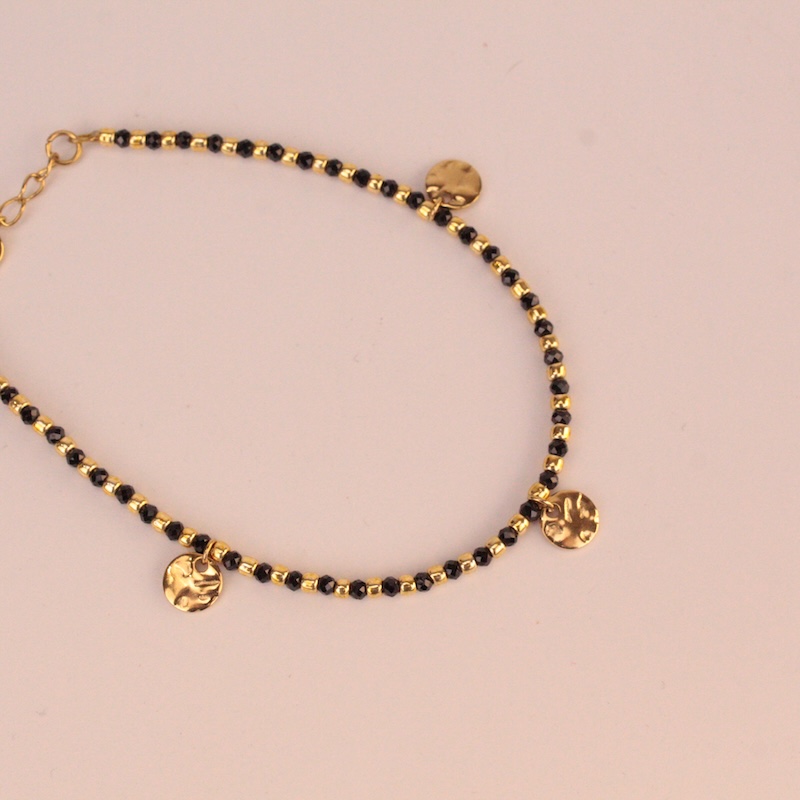 Pulsera con piedras dorada y negra