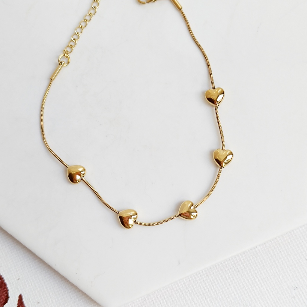 Pulsera Corazones Dorado