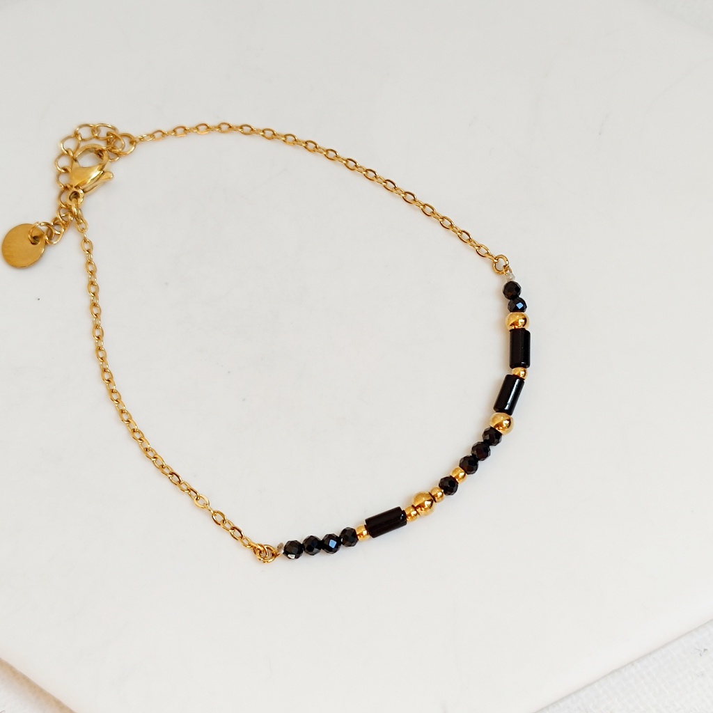 Pulsera Cuentas Negras Dorada