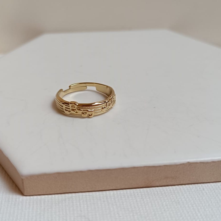 Anillo Letras Musicales Dorado