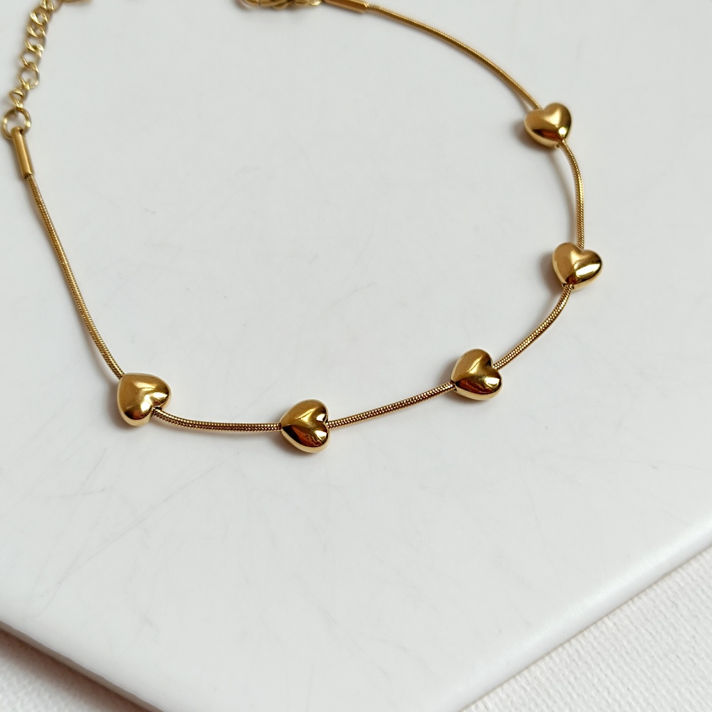Pulsera Corazones 3D (Dorado)