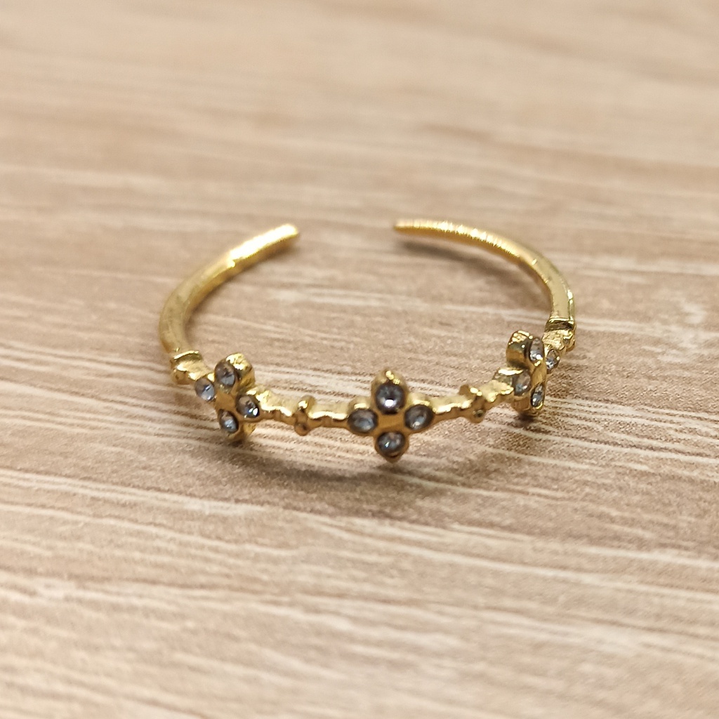 Anillo triple flor circonitas dorado