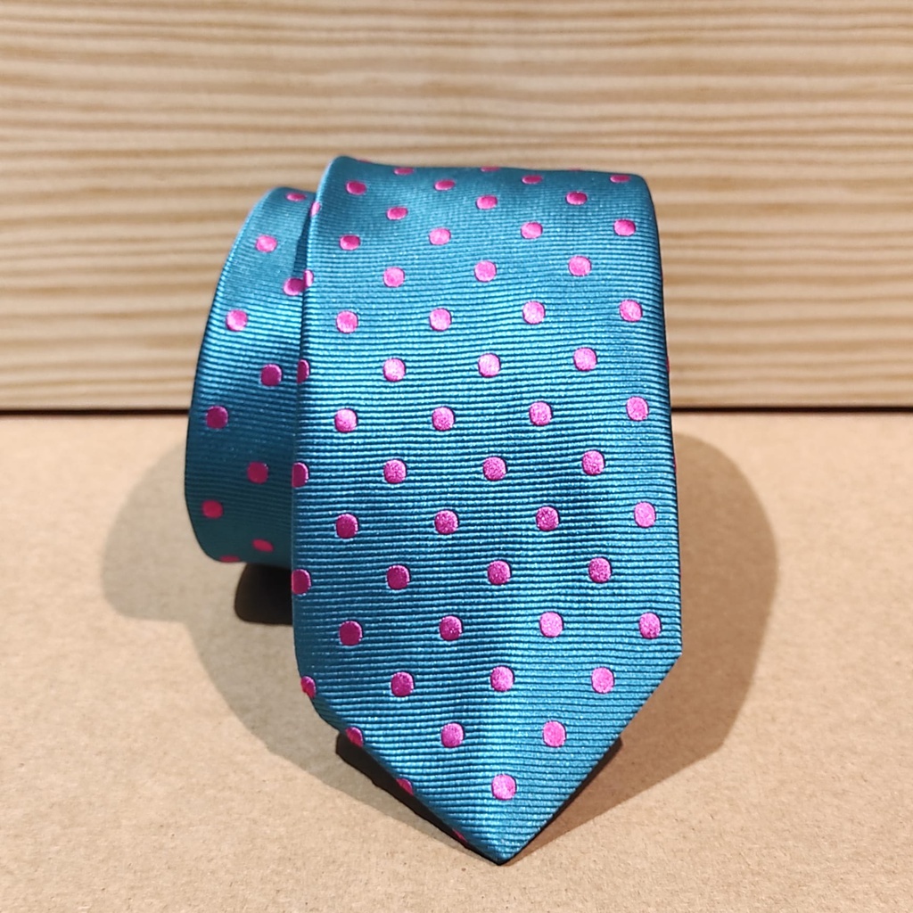 Corbata verde esmeralda con topos rosa fucsia