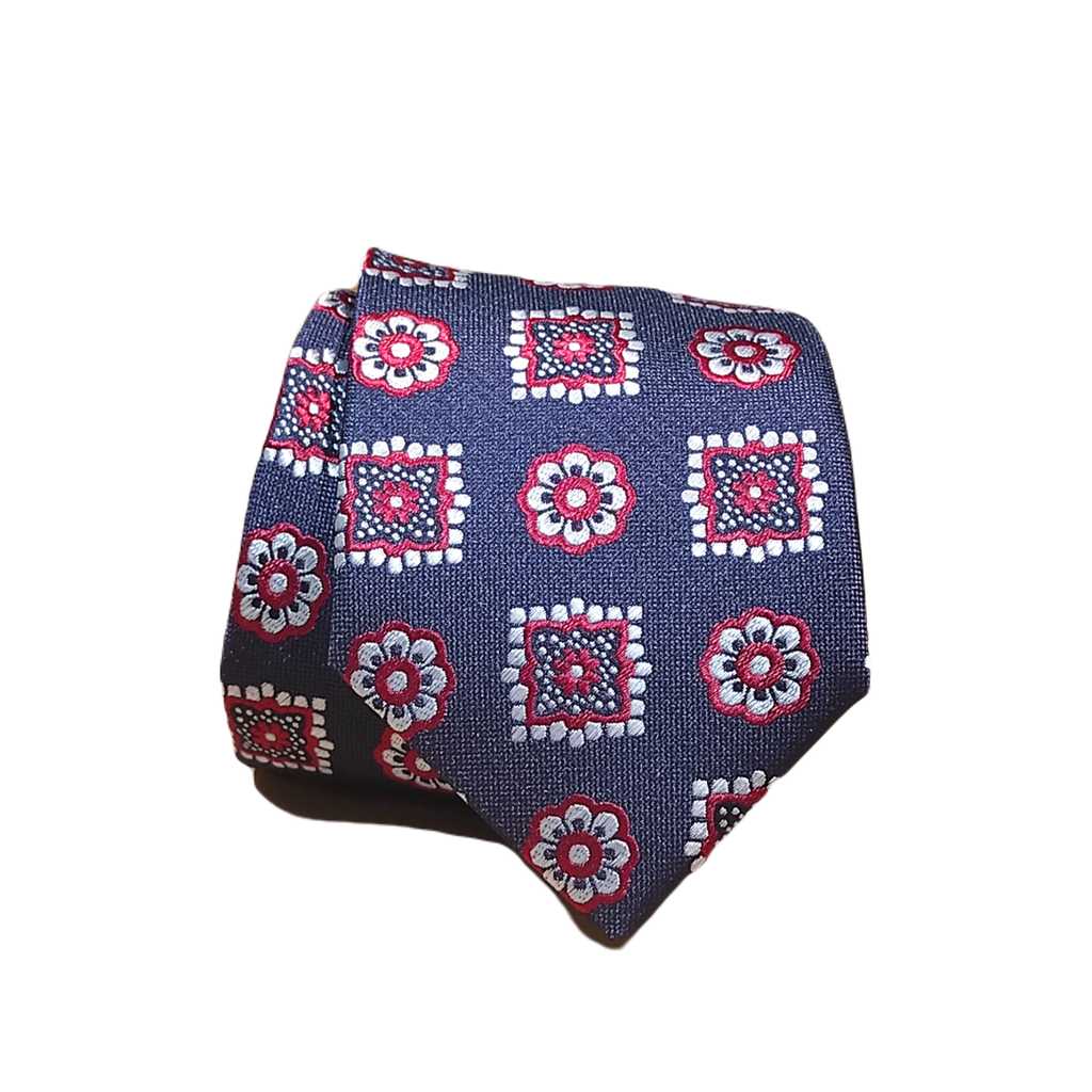 Corbata azul marino con motivos geométricos rojos