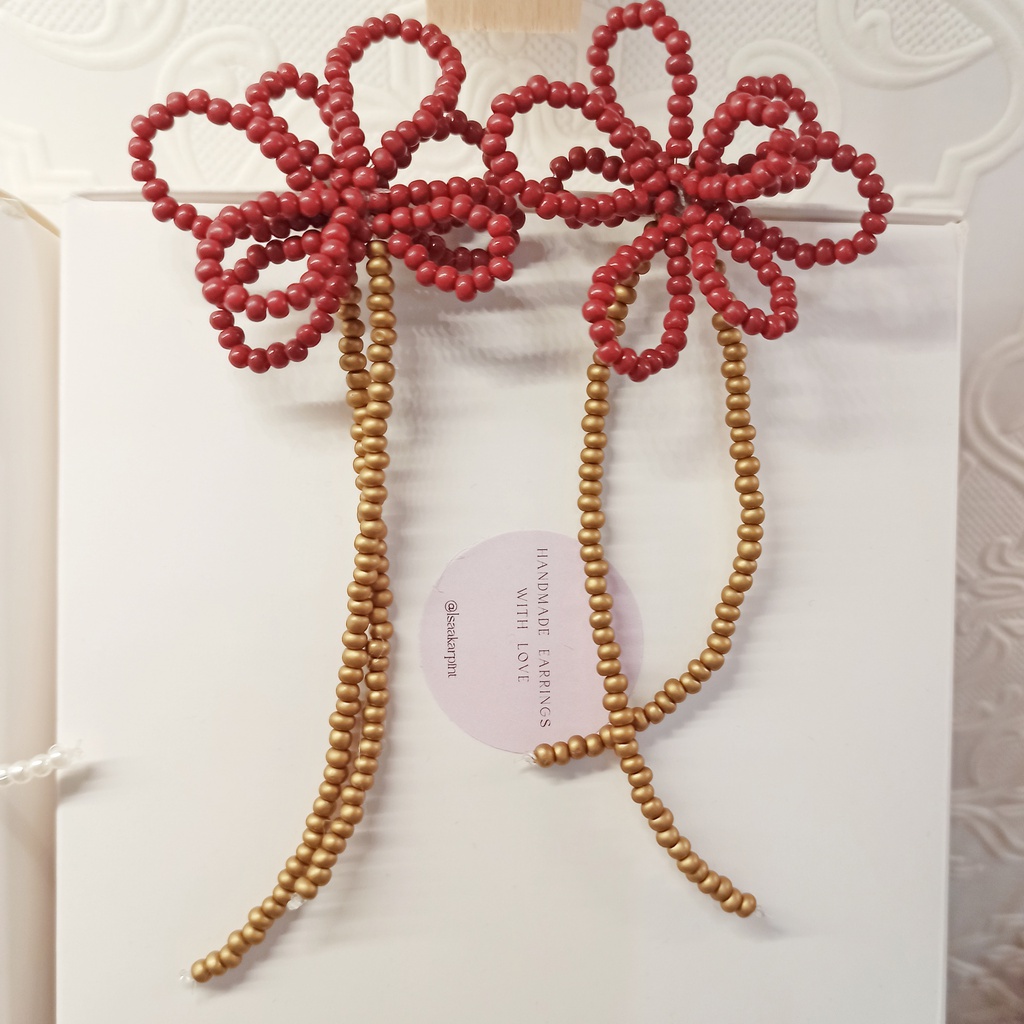 Pendientes Isakarpintero Flores Granates y Dorados
